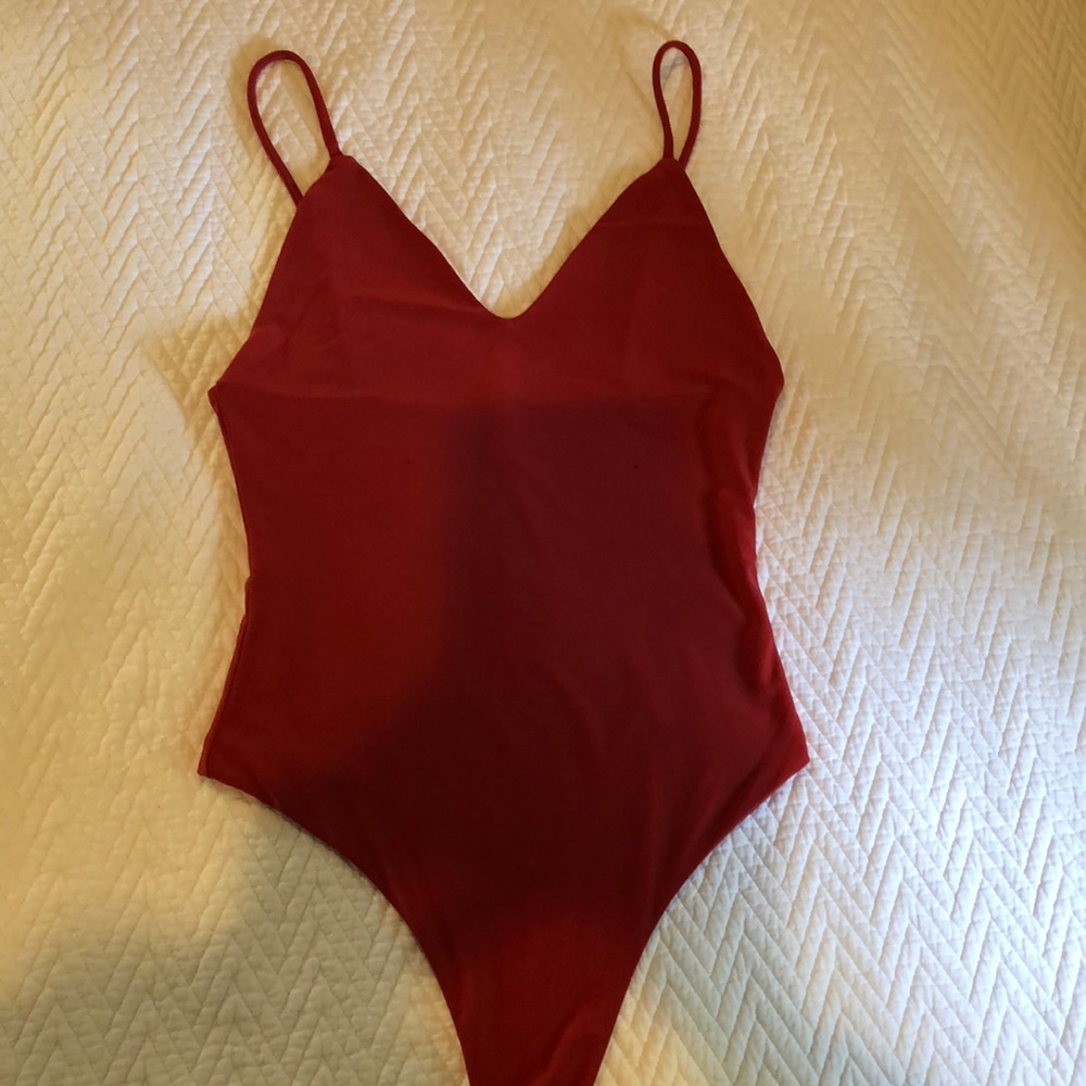 Rust color body suit
